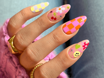 checkered flower and smiley face mismatch hippie nails