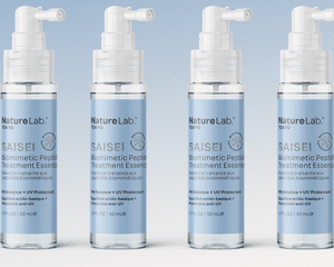 Naturelab Tokyo Saisei Hair Essence on a blue background