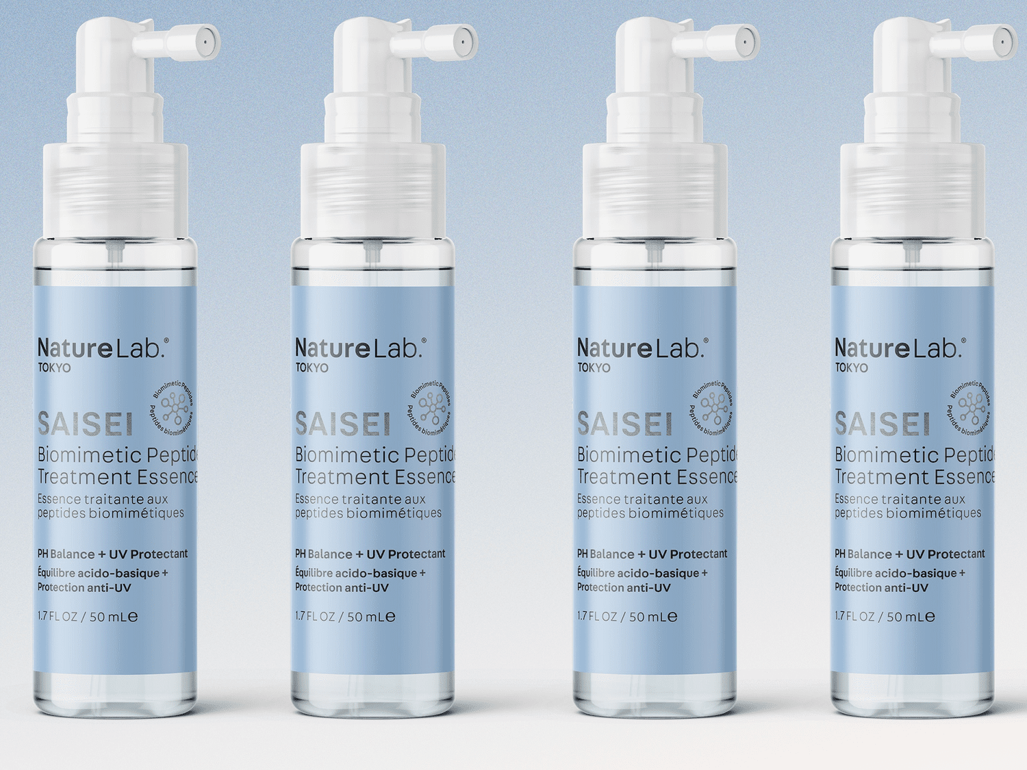 Naturelab Tokyo Saisei Hair Essence on a blue background