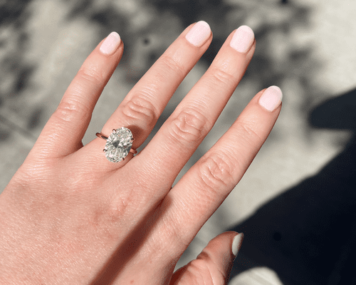 woman with light pink russian manicure 