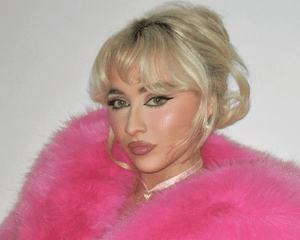 Sabrina Carpenter wearing pink fur