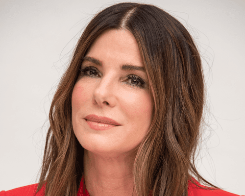 close up of sandra bullock wavy bob on white background