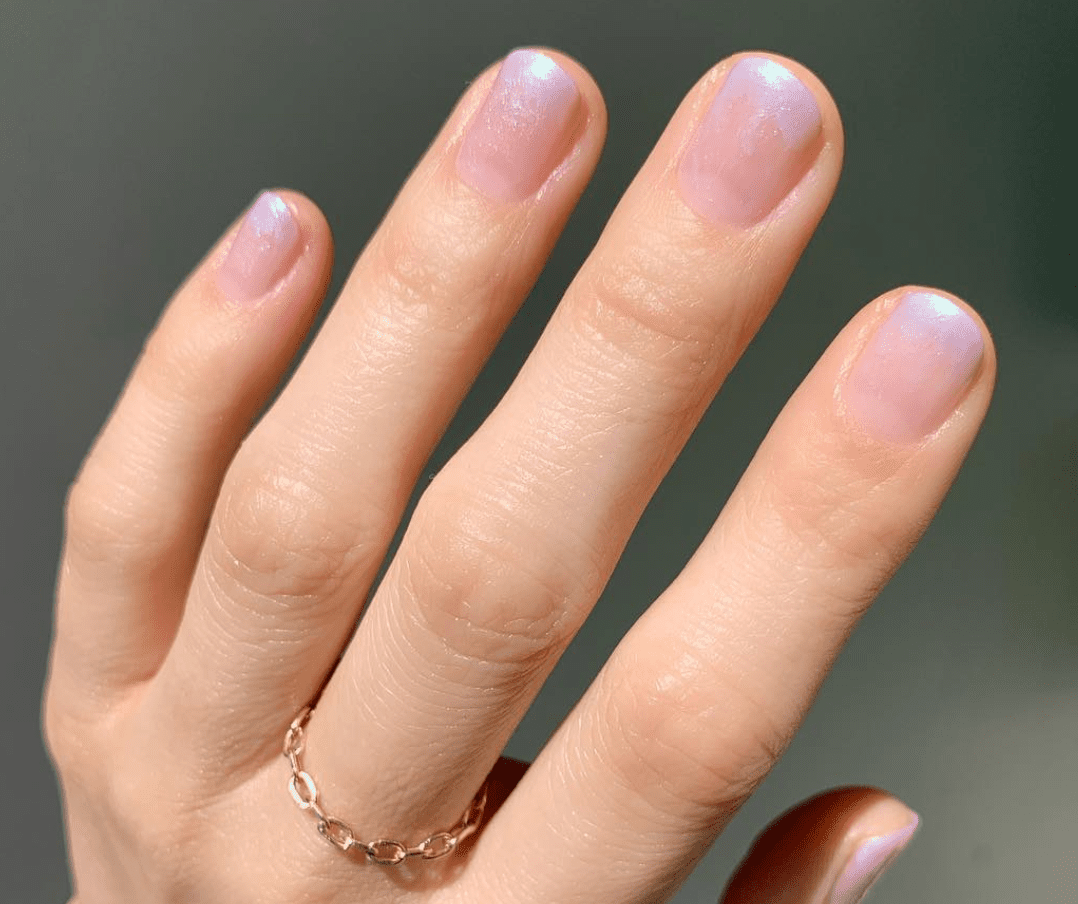 close up of pink ombre sparkle nails