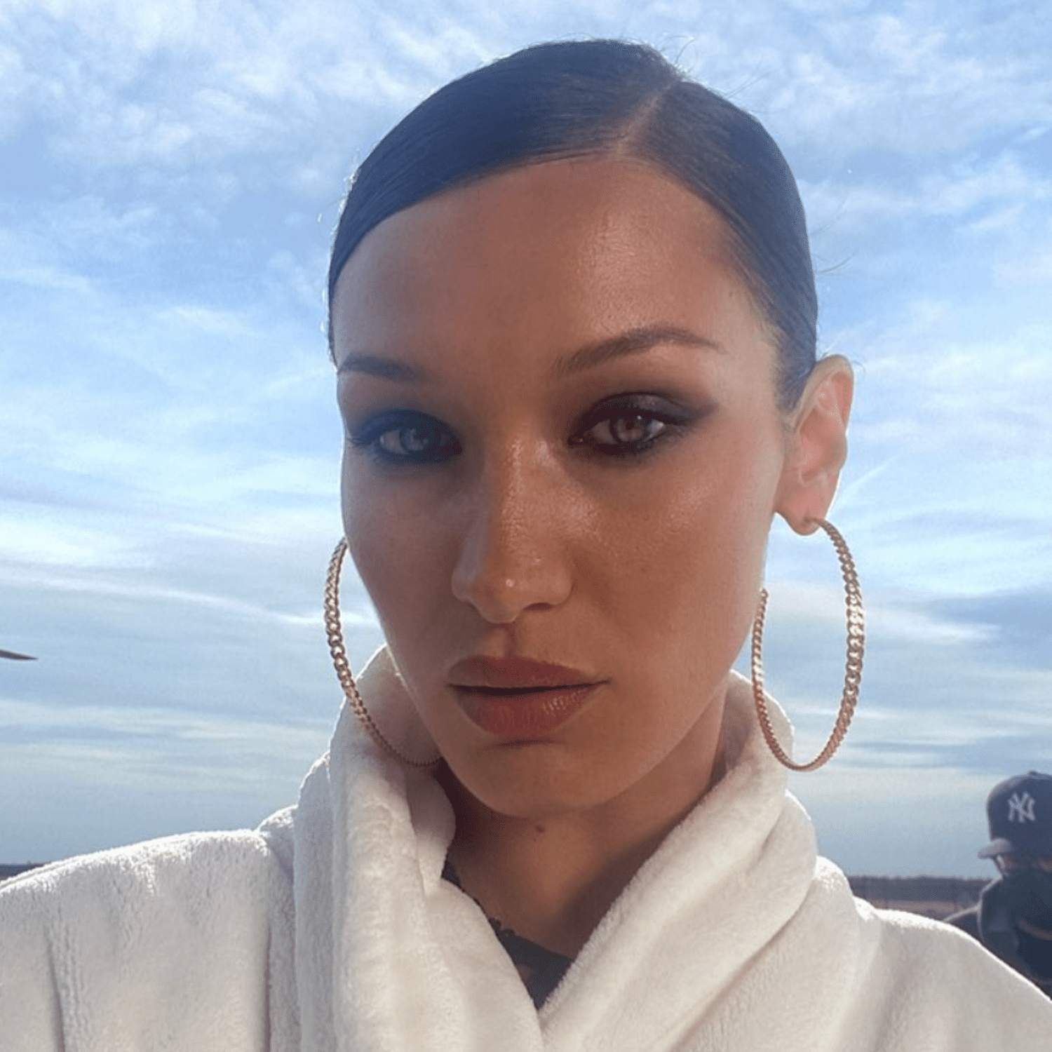 Bella Hadid with a side parted updo