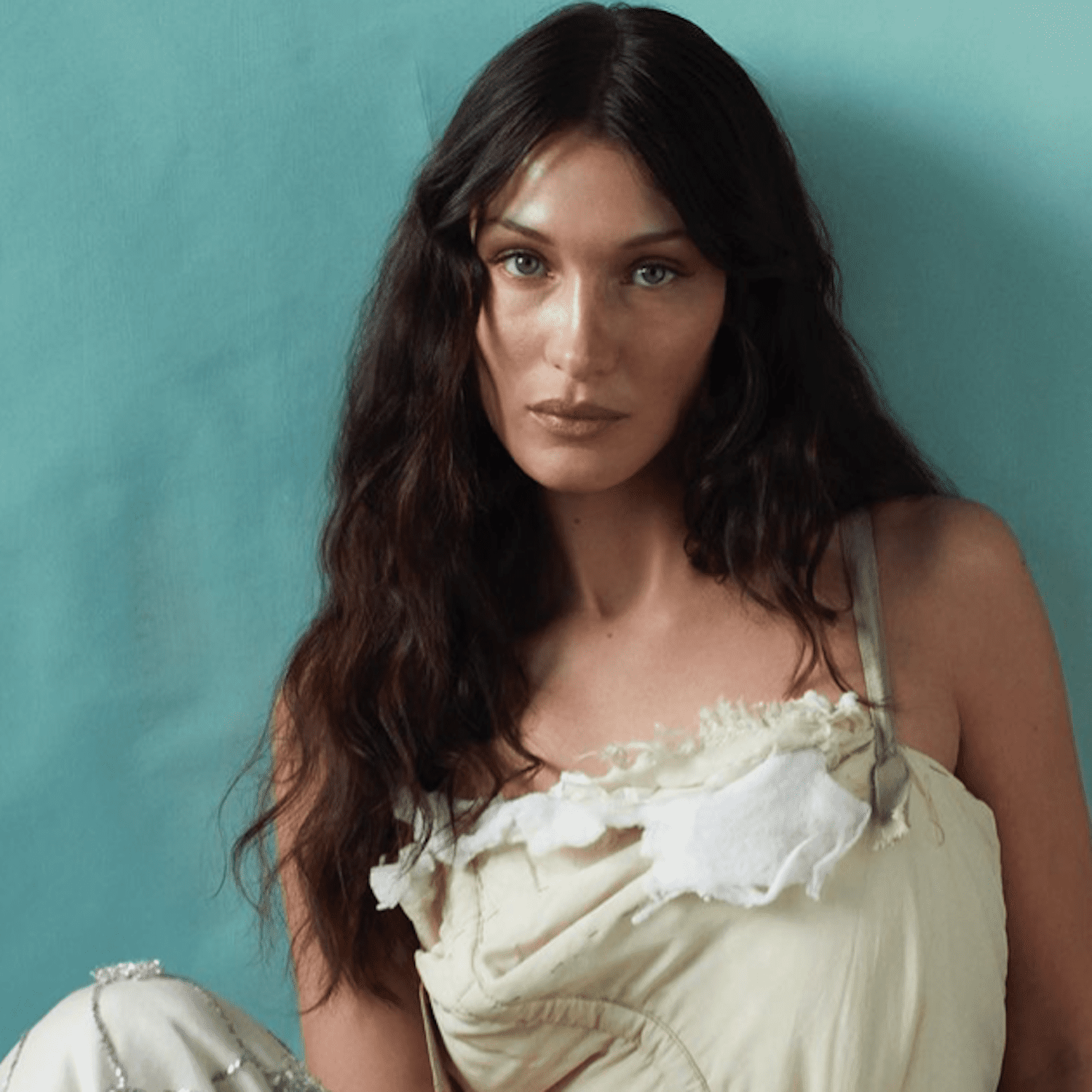 Bella Hadid with a center part and air-dried hair