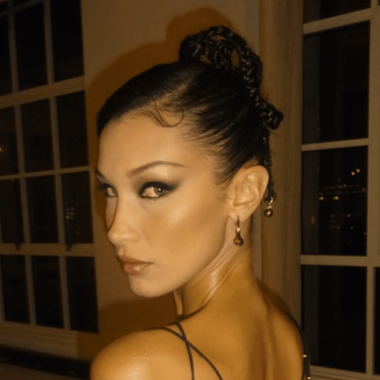 Bella Hadid with a braided updo