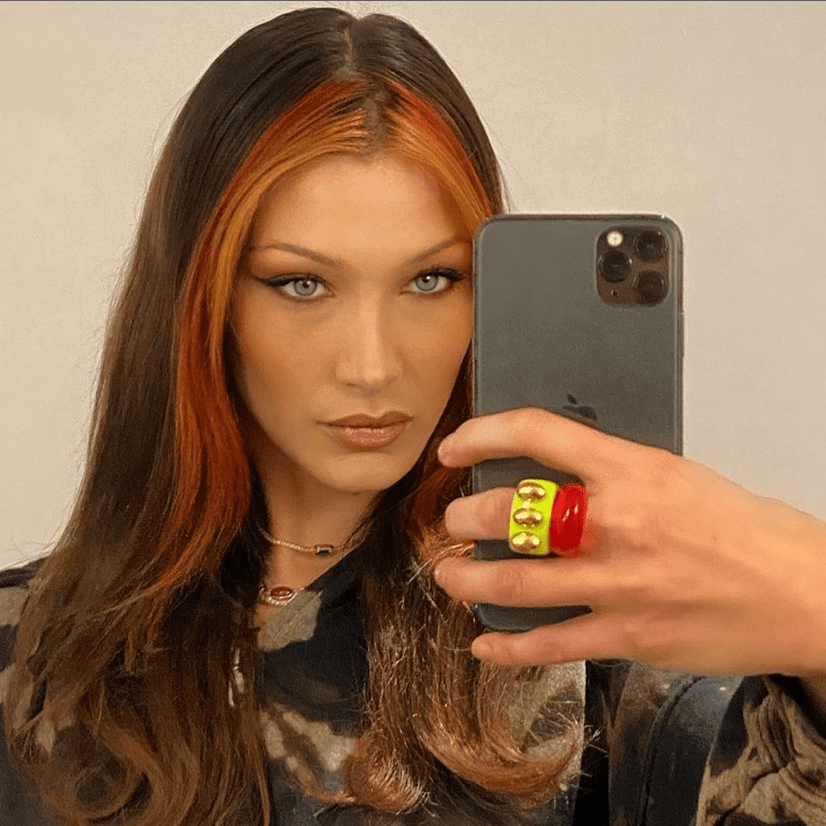 Bella Hadid with orange accented hair