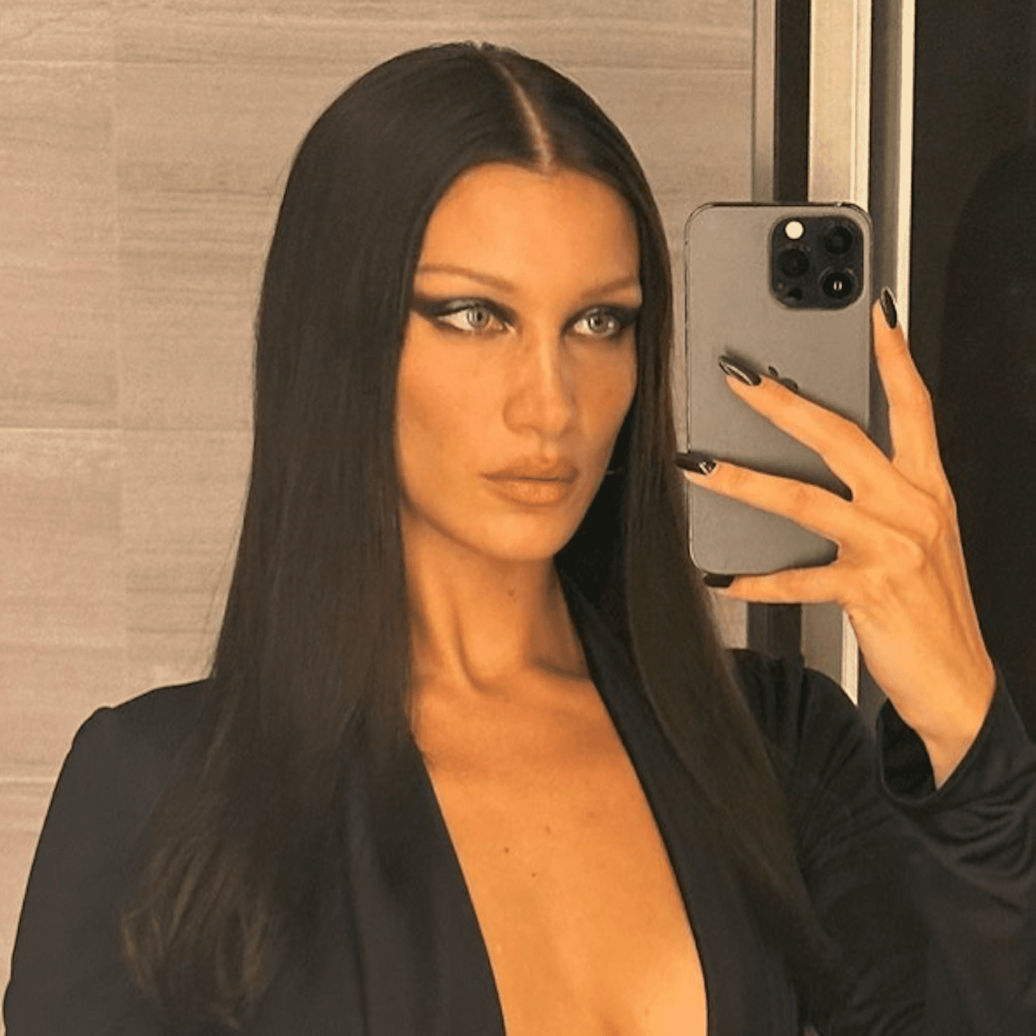 Bella Hadid with center parted straight hair