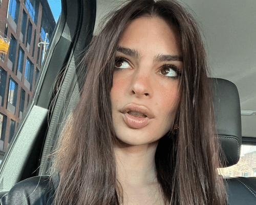 emrata looking out side of car window