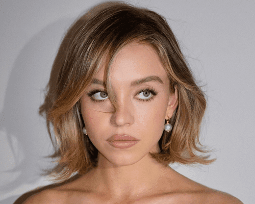 Close up of Sydney Sweeney with a reverse balayage bob.