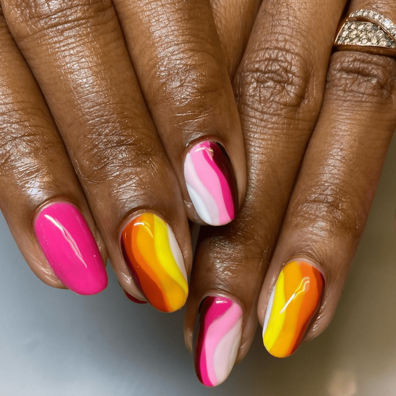 Bright colored wavy nail art design