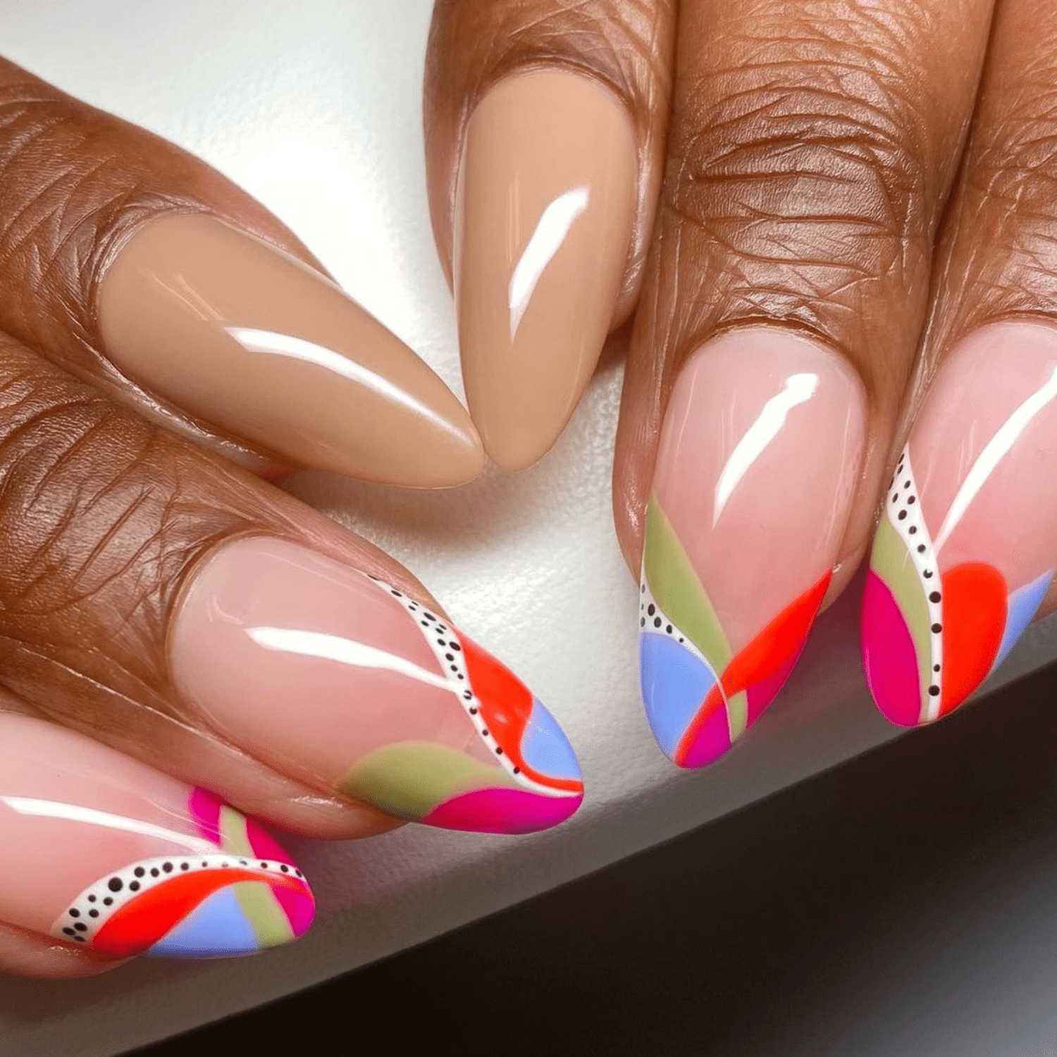 Nude nails with colorful nail art