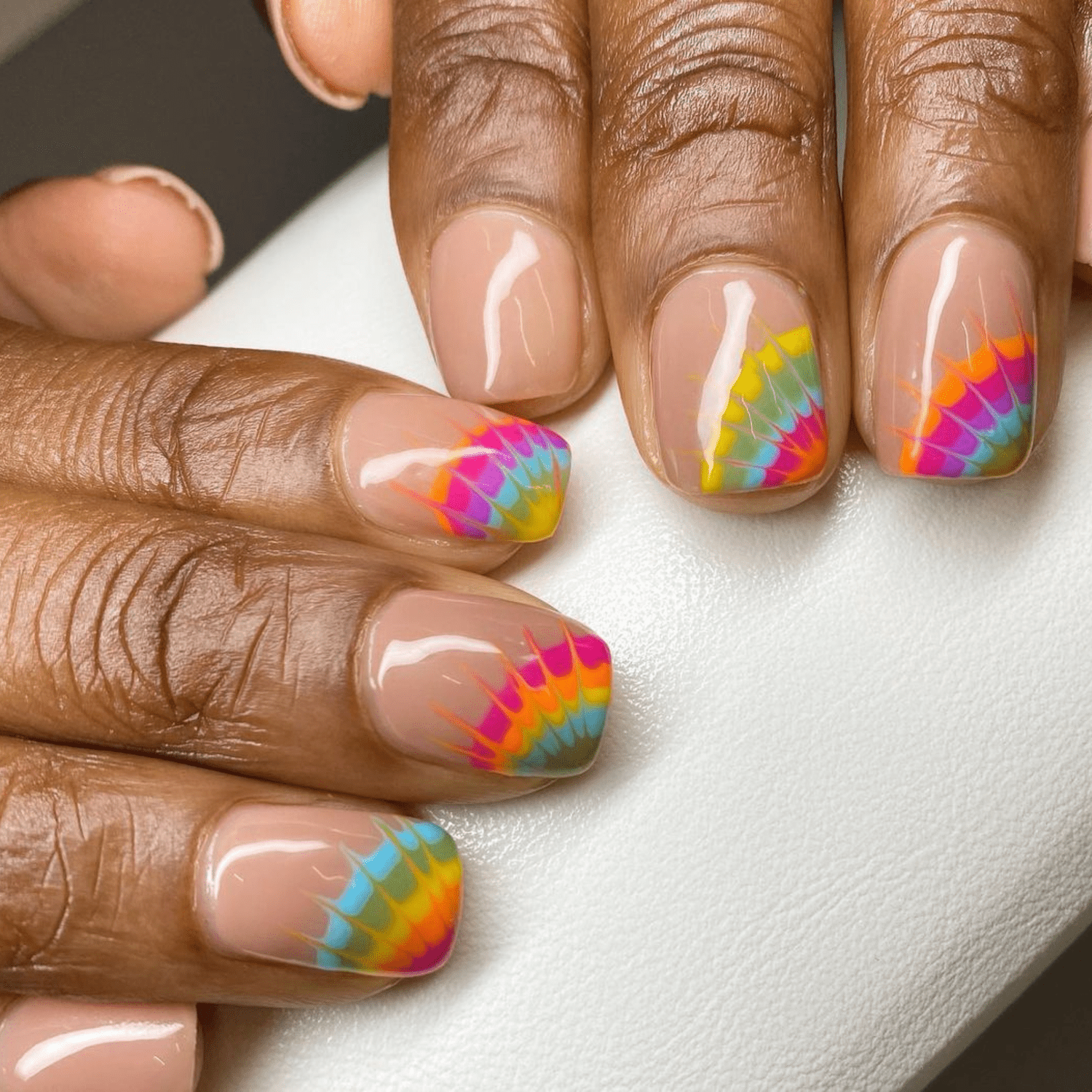 Nude nails with tie dye detail