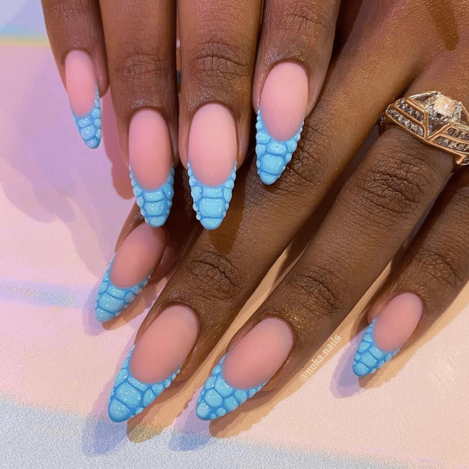 Blue reptile textured French manicure